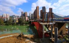 铜仁市清水大桥改扩建工程 上游侧桥桥梁拱圈组装今日合拢