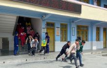 松桃县寨英镇完小开展消防演练活动