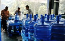 万山龙门坳村做足水文章桶装水产销两旺