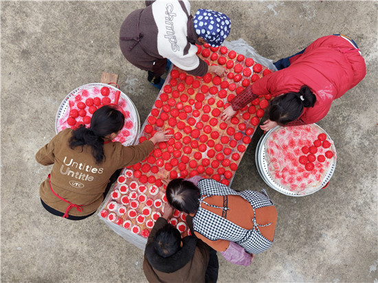 石臼响，红粑香！江口净河村返乡青年把乡愁揉进新春团圆里