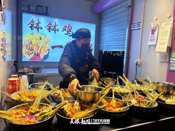 【网络中国节·春节】瓦窑河集市开街：钵钵鸡里守出幸福年