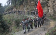 松桃县人民武装部重走长征路传承革命精神